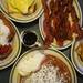 Clockwise from left, Angelo's deep-fried french toast, eggs benedict, bacon, crab benedict and pumpkin pancakes. Melanie Maxwell I AnnArbor.com